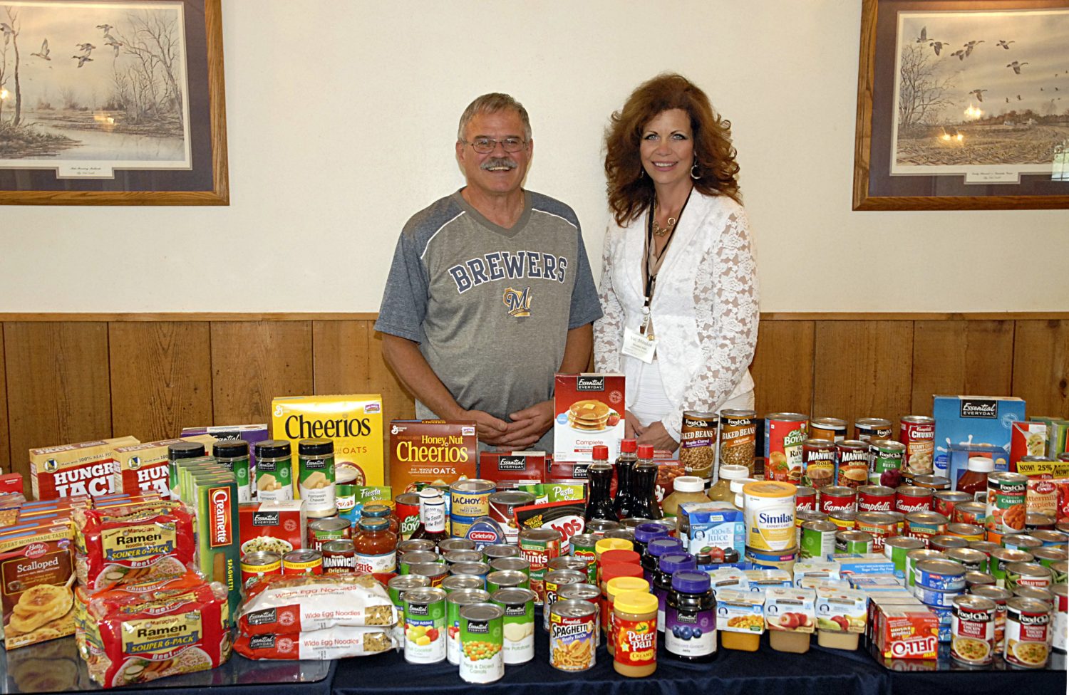 Merrill Rotary Club donates over 300 lbs of groceries to food pantry