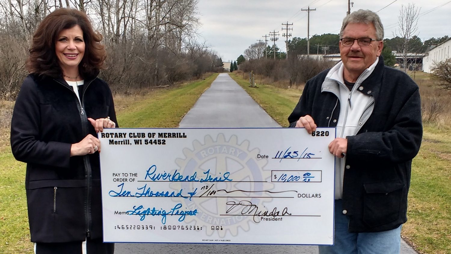 Rotary Club kicks off trail lighting project with $10,000 donation