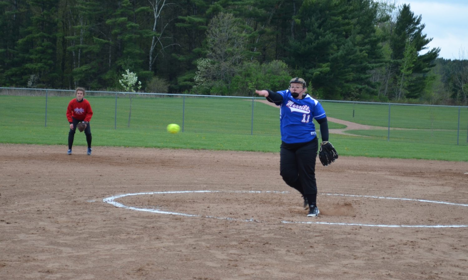 Wind and rain couldn’t stop Bluejay fast-pitchers