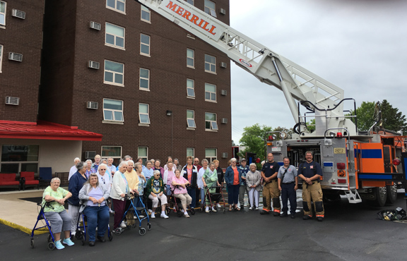 MFD staff, Jenny Towers residents team up for a little brush-up