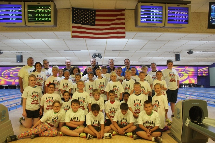 MPD officers and area youngsters let ‘em roll at ‘Gutter Busters’ event