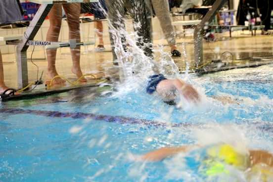 Merrill swimmers give West a run for their money