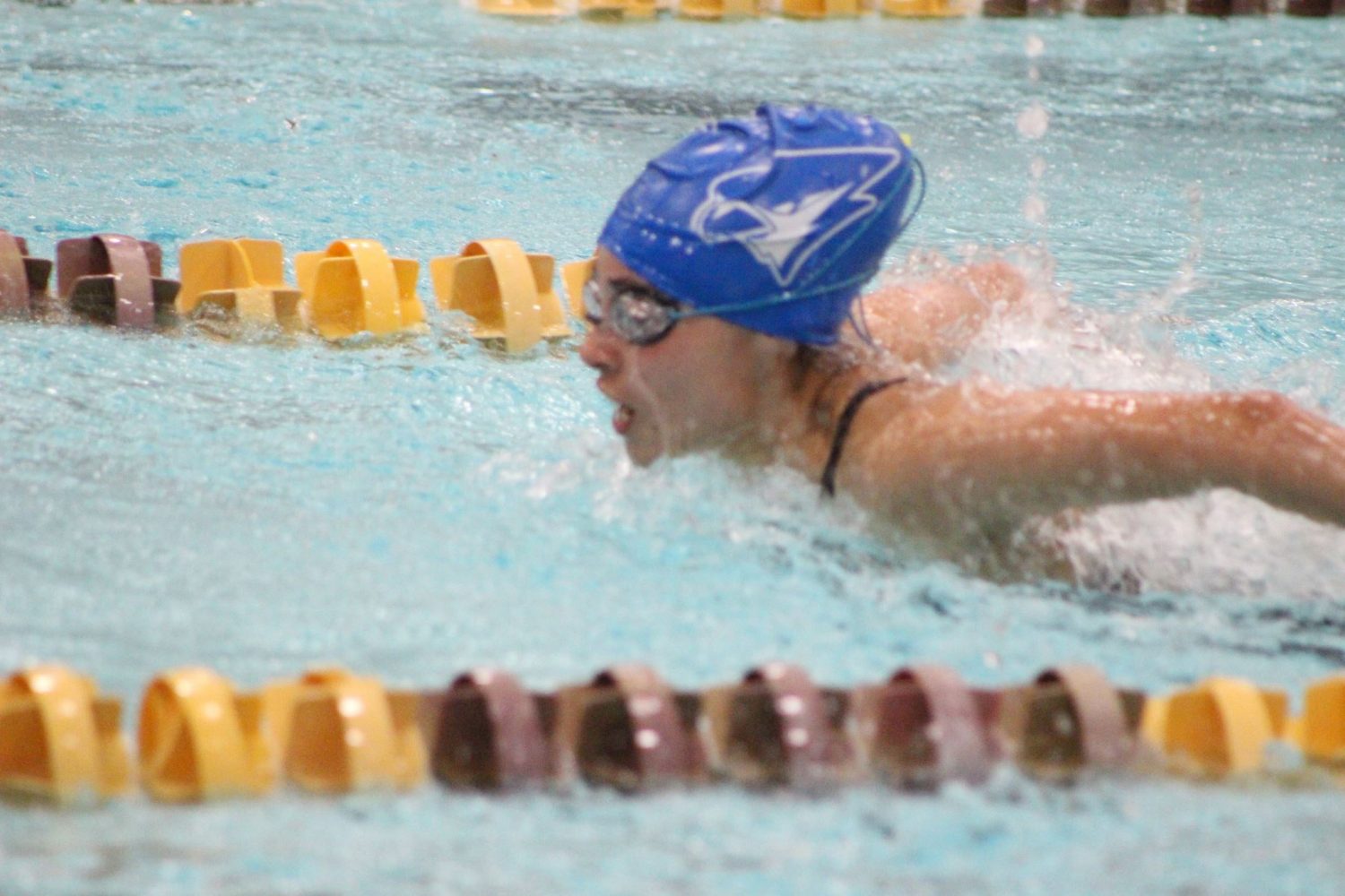 Merrill swimmers set personal bests, new records at conference meet