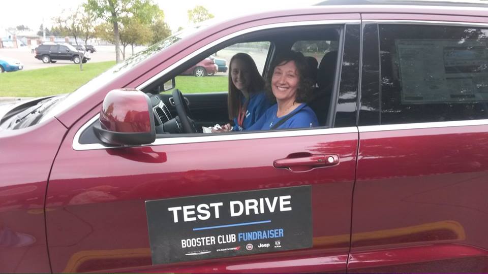 Test drives raise $3,000 for booster club