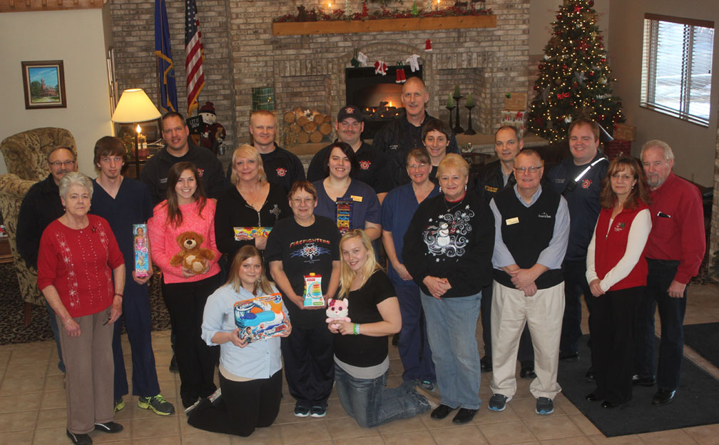 AmericInn employees donate to Tree of Hope
