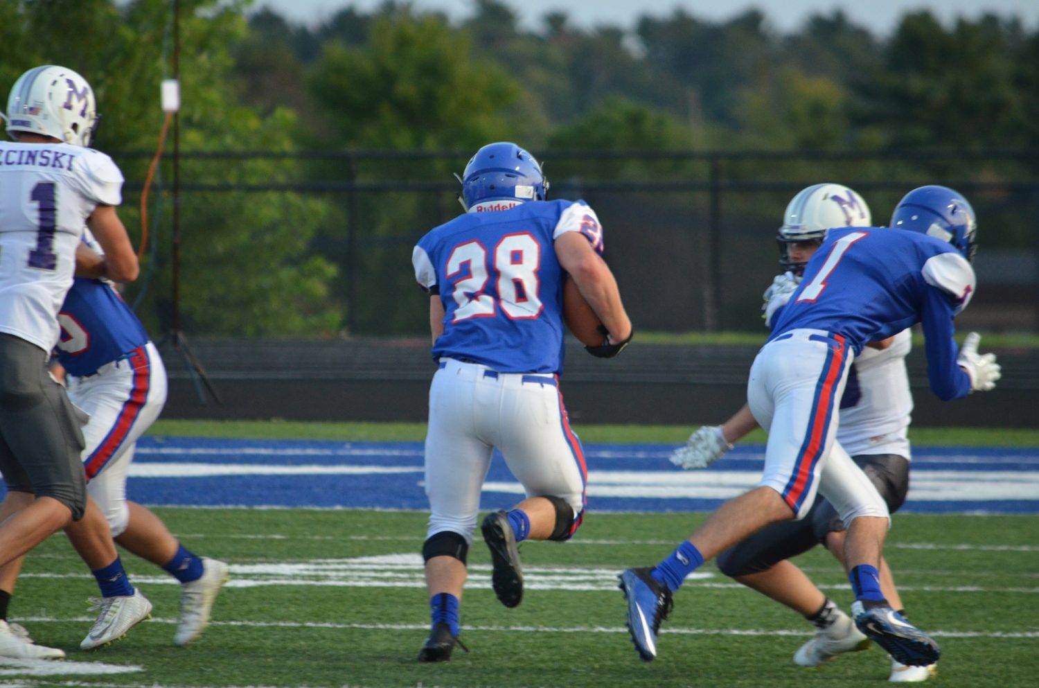Merrill football shines in conference opener