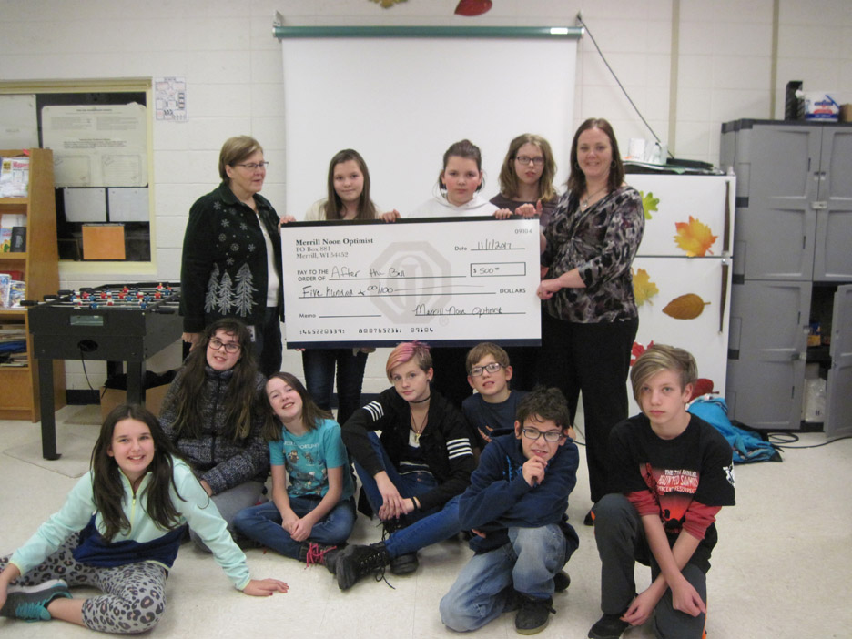 Optimists donate to the ‘After the Bell’ program