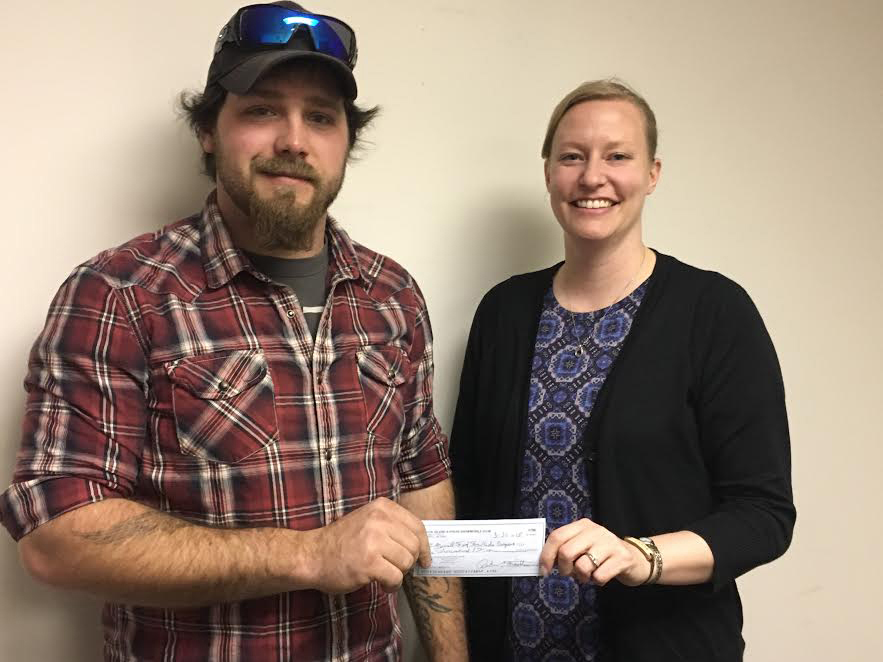 Snowmobile ride fundraiser yields $1,000 for local food program