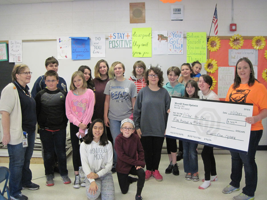 Optimist Club donates to the ‘After the Bell’ program