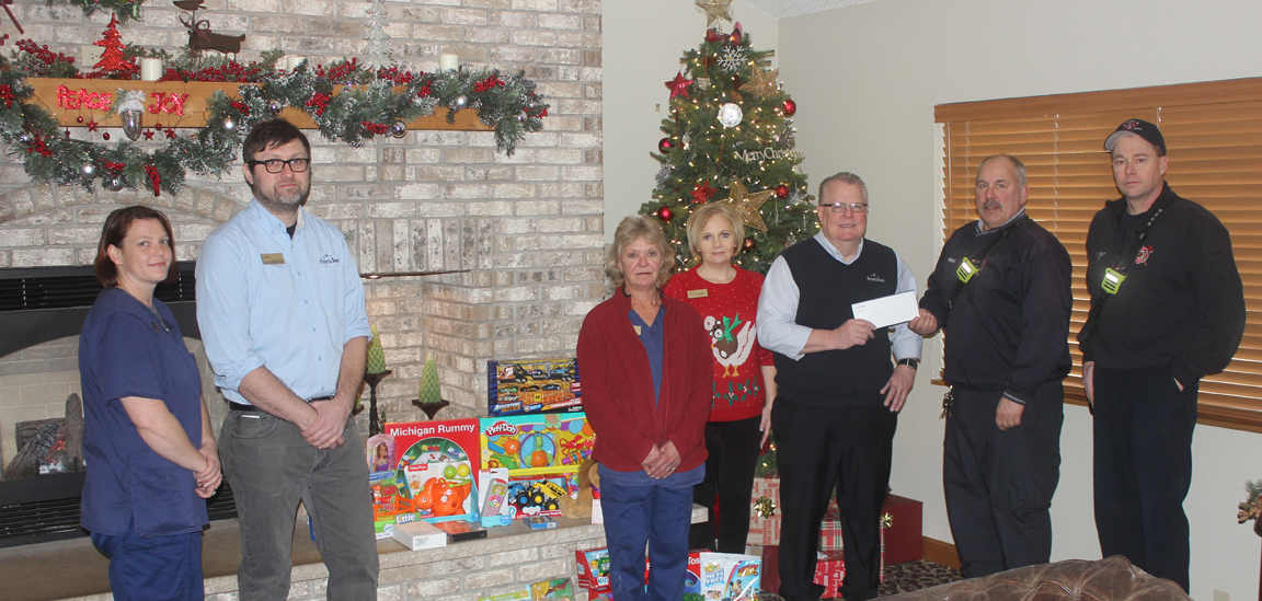 AmericInn collects for Tree of Hope