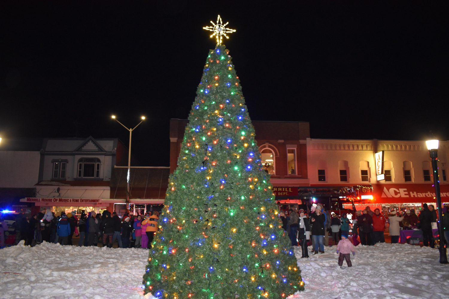Merrill Chamber erects massive Christmas tree in Banker’s Square