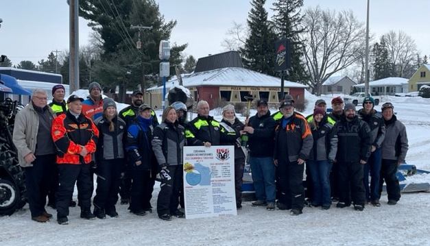 2022 Snowmobile Torch Ride brings Badger State Winter Games torch through Merrill