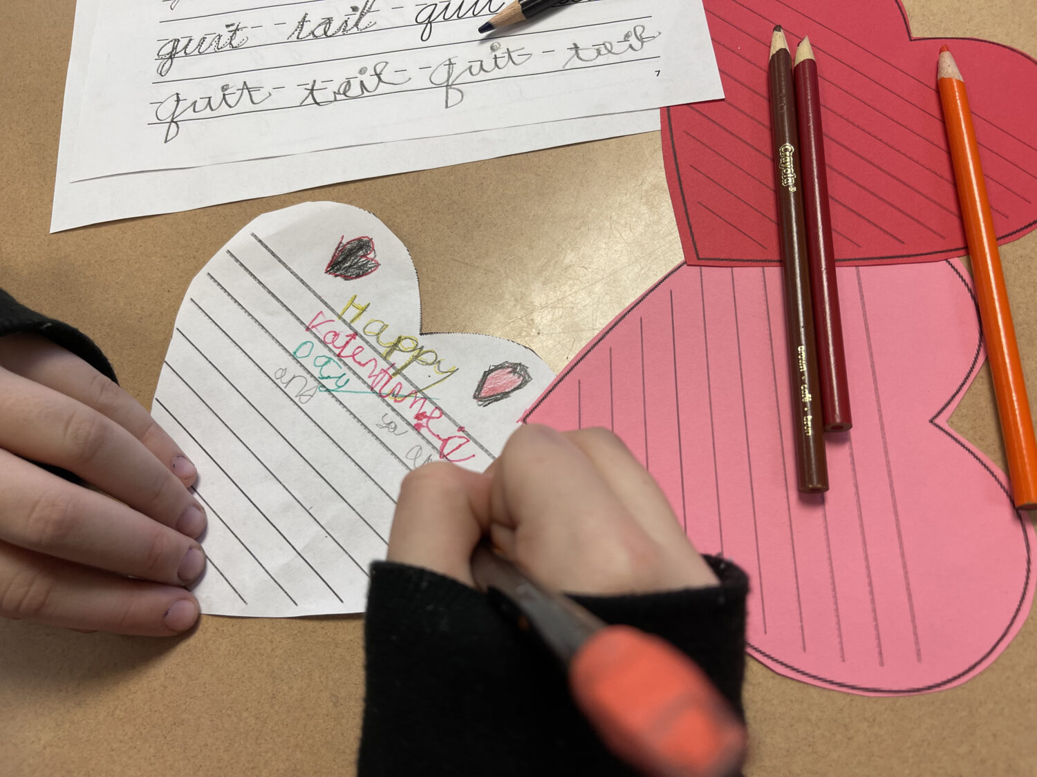 Washington School students spread the love and practice cursive with Valentines for seniors