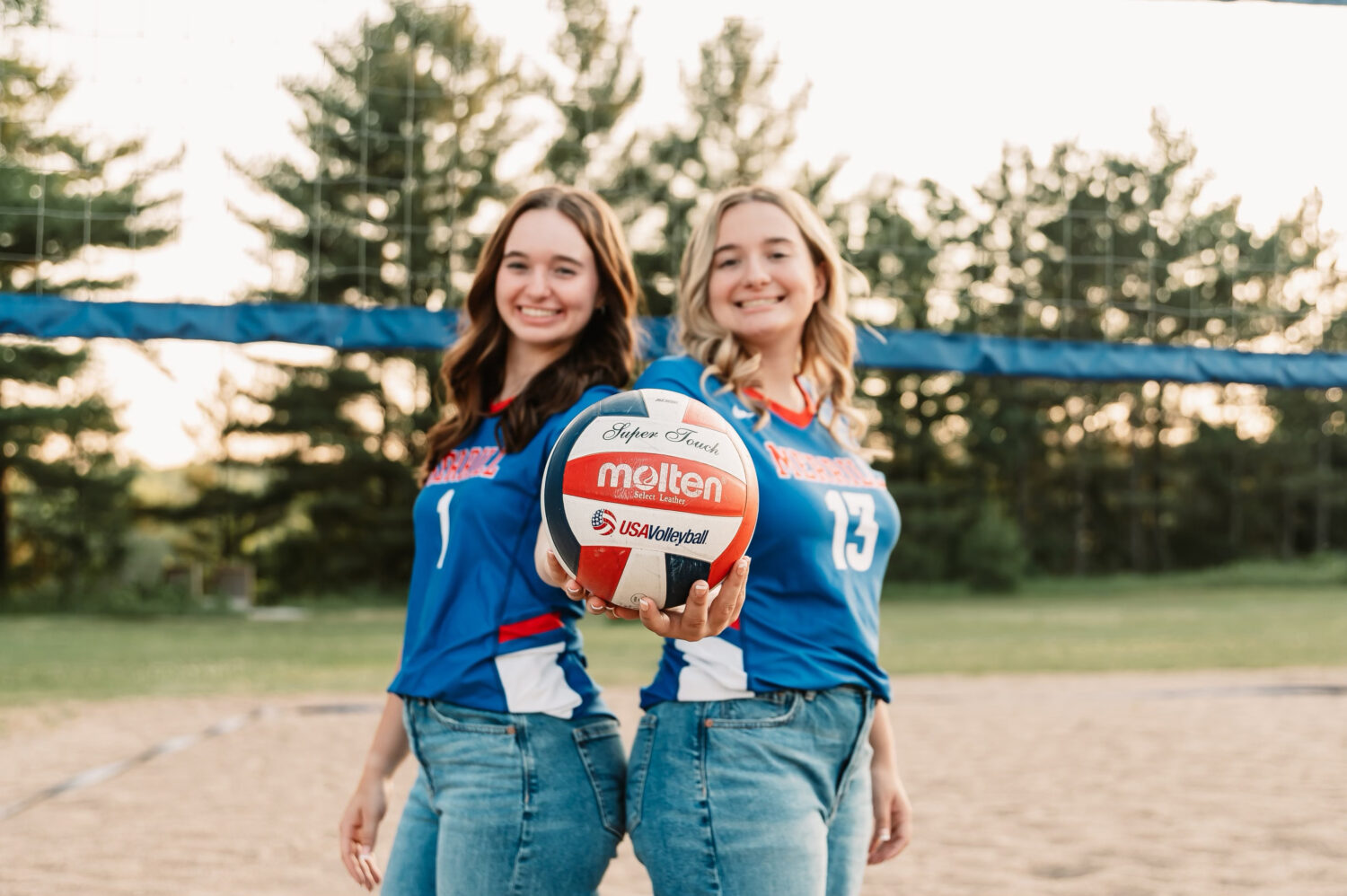 Merrill Varsity Volleyball twins each complete their 1,000th career assist