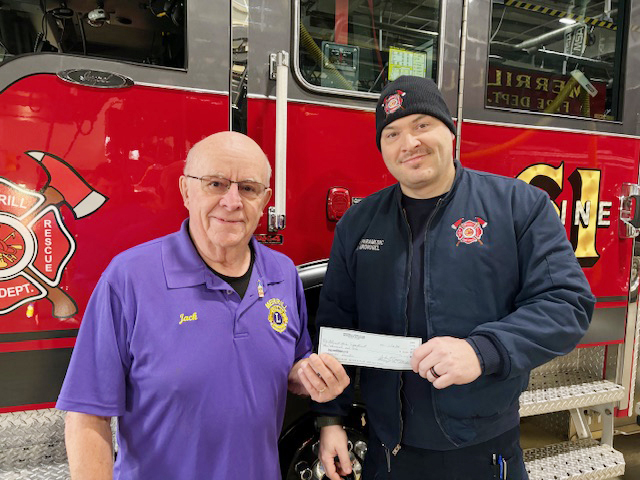 Lions donate to Merrill Fire Department